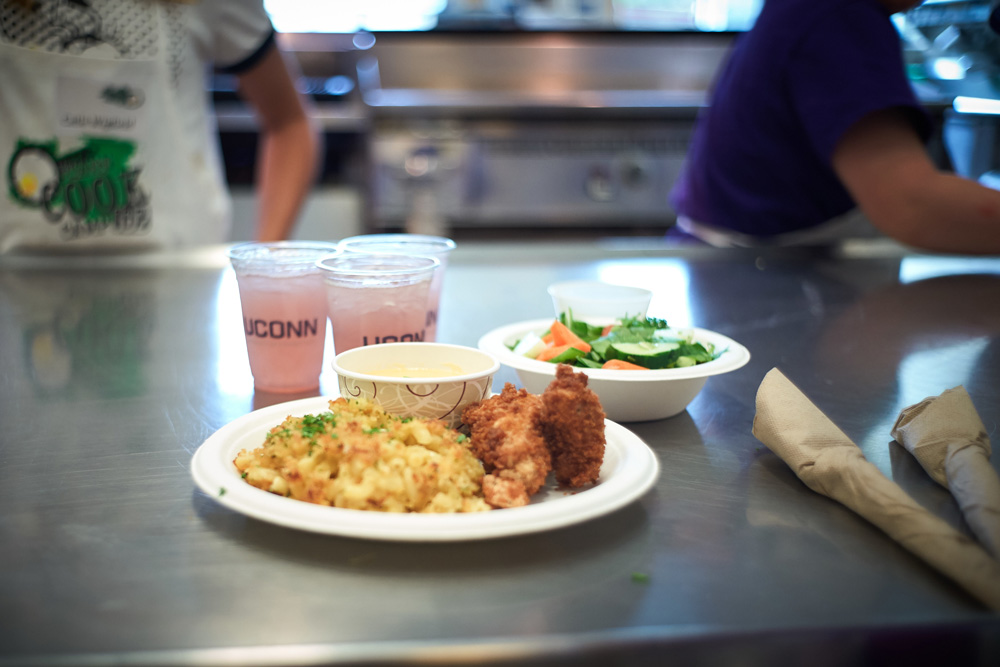 Mac 'n cheese, chicken nuggets, sauce and a vinaigrette salad was one team's entry during a competition at the UCann Cook Camp at Gelfenbien Commons